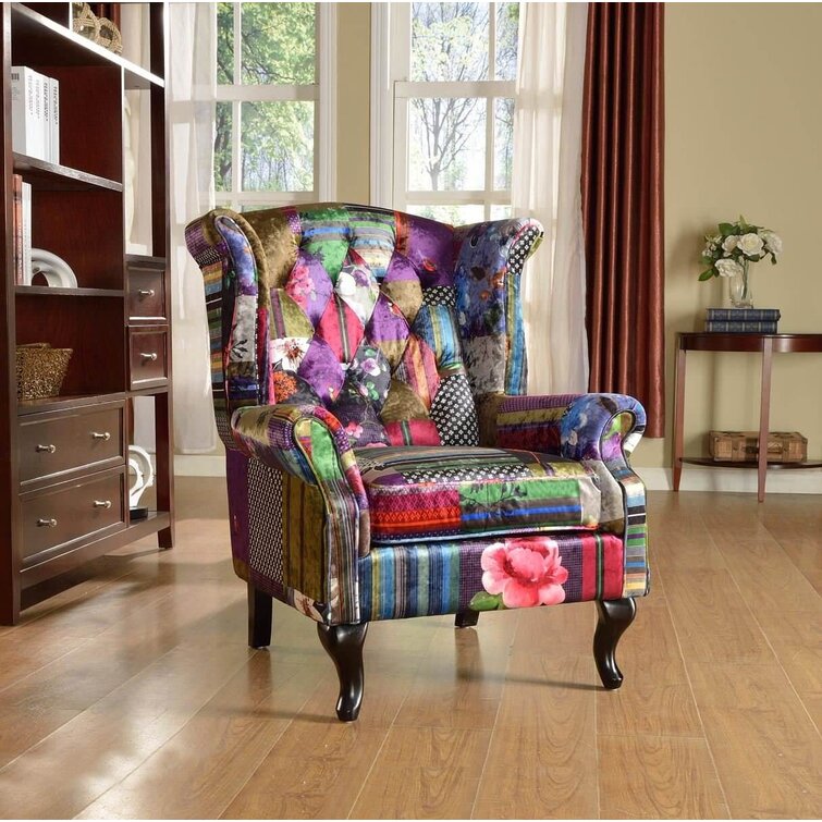 Upholstered wing store back chair